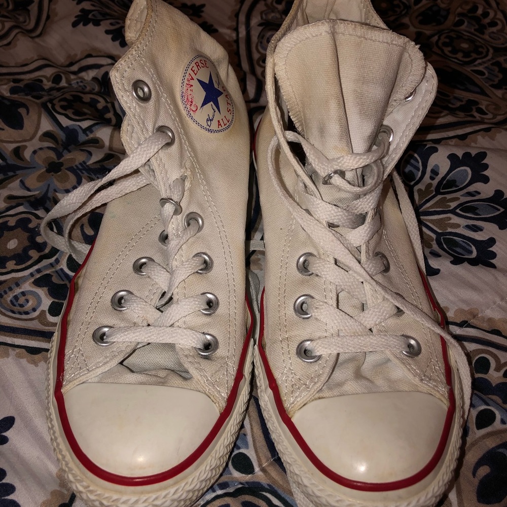 Very worn white converse, still in good condition